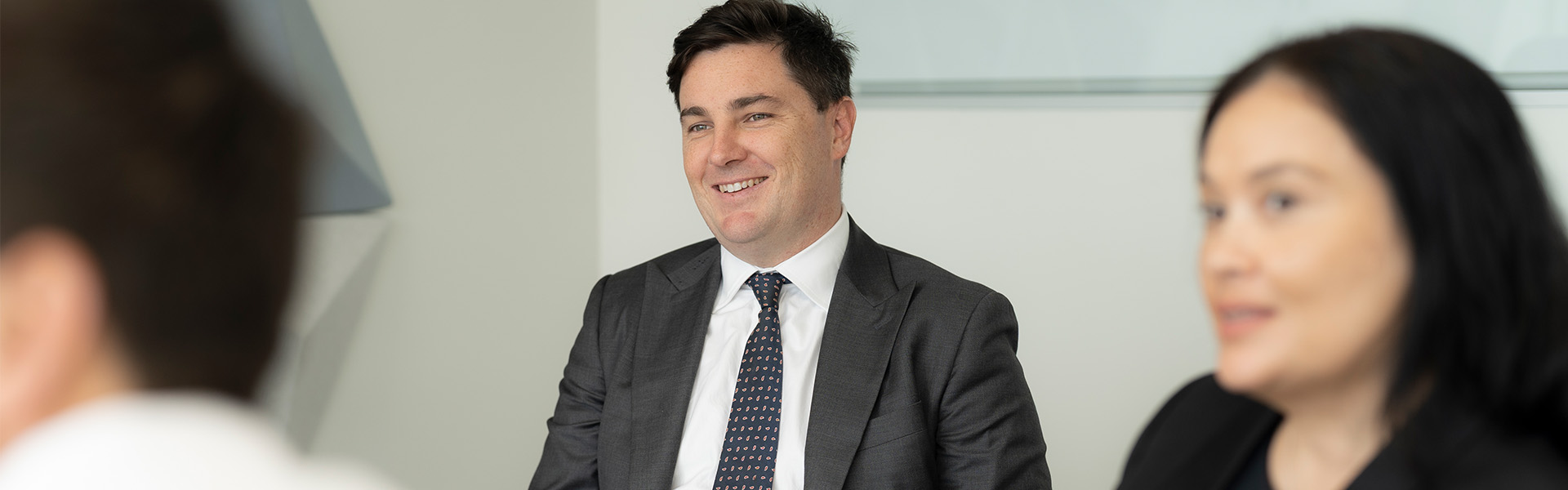 man and woman in meeting